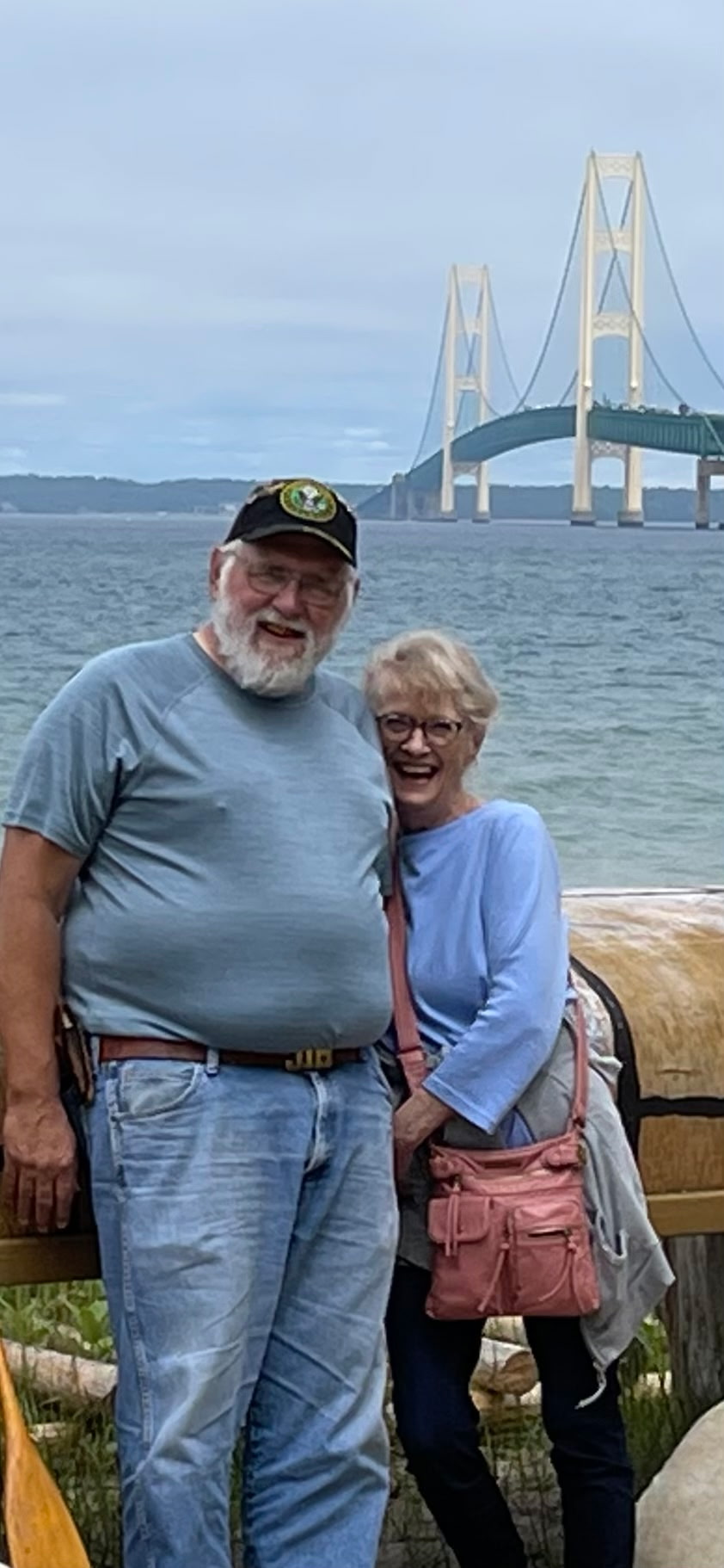 Jim and Sue on a bridge in the snow.